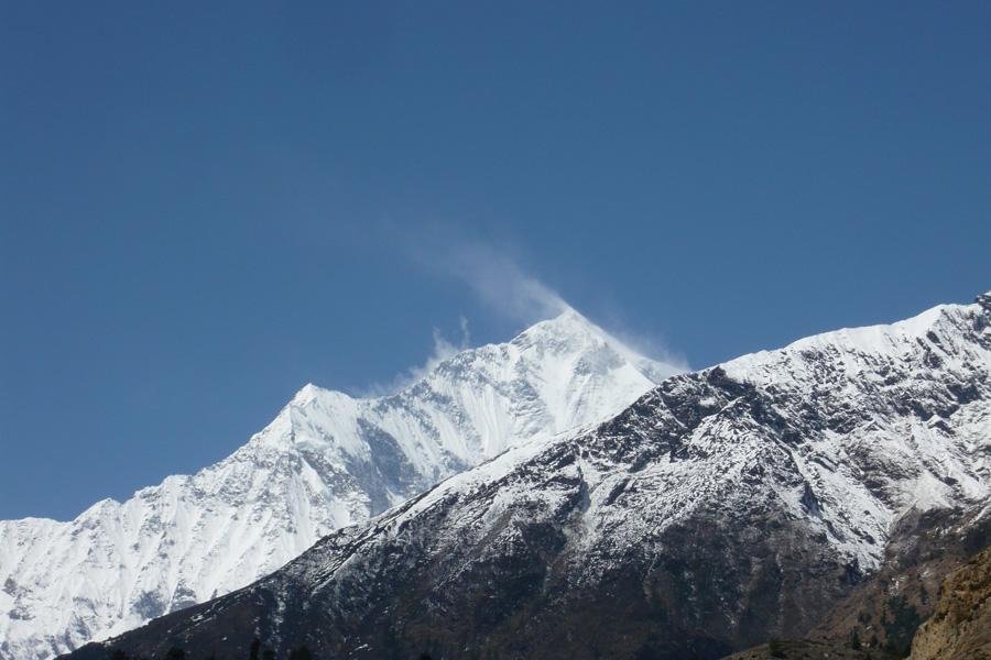 Explore Jomsom Muktinath Trek with activities like Trekking